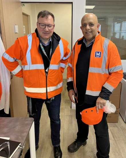 Mount representative with Nippon Paint France staff at the coatings manufacturing facility