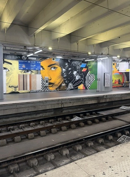 Paris metro mural seen while travelling to Nippon Paint France