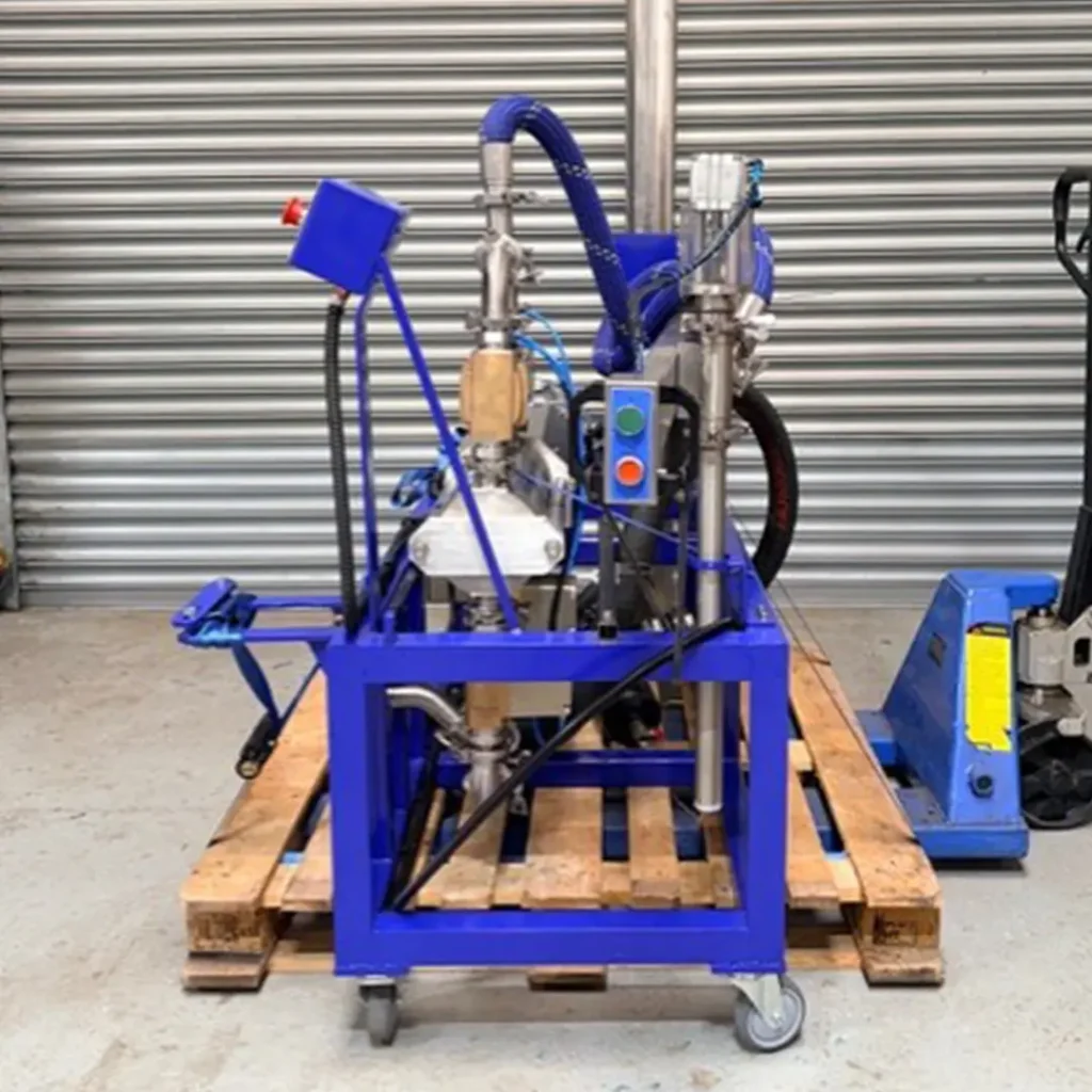 Front view of the refurbished ROCOL mini filling machine with upgraded controls